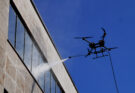 ABZ Innovation cleaning drone operating near a building facade