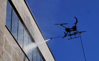 ABZ Innovation cleaning drone operating near a building facade