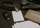 Security key, access badge, cables, and blank checklist for secure AI coding agent deployment