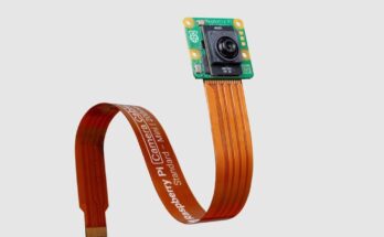 Official Raspberry Pi AI Camera product photo showing the camera module and ribbon connector
