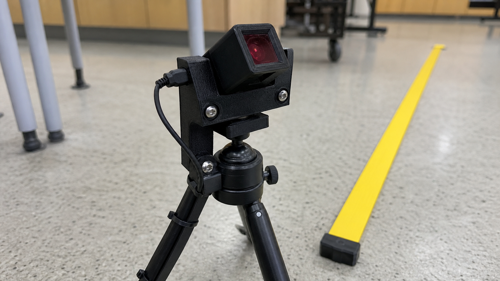 Close-up of timing gate sensor mount and cable strain relief