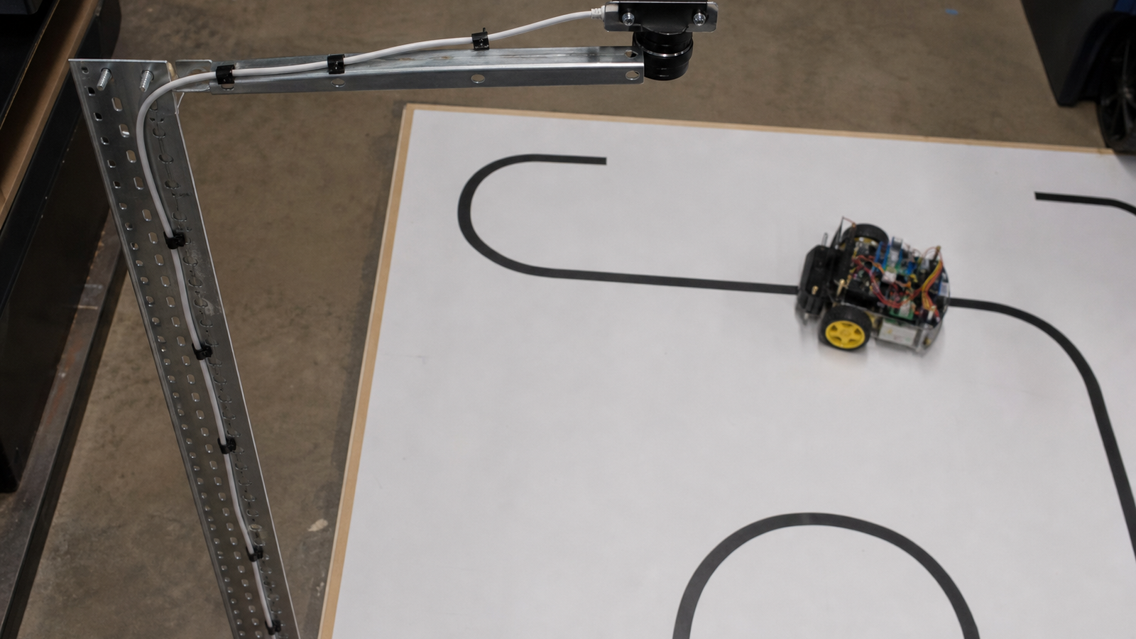 Overhead fixed camera view of a small robot test area connected by Ethernet