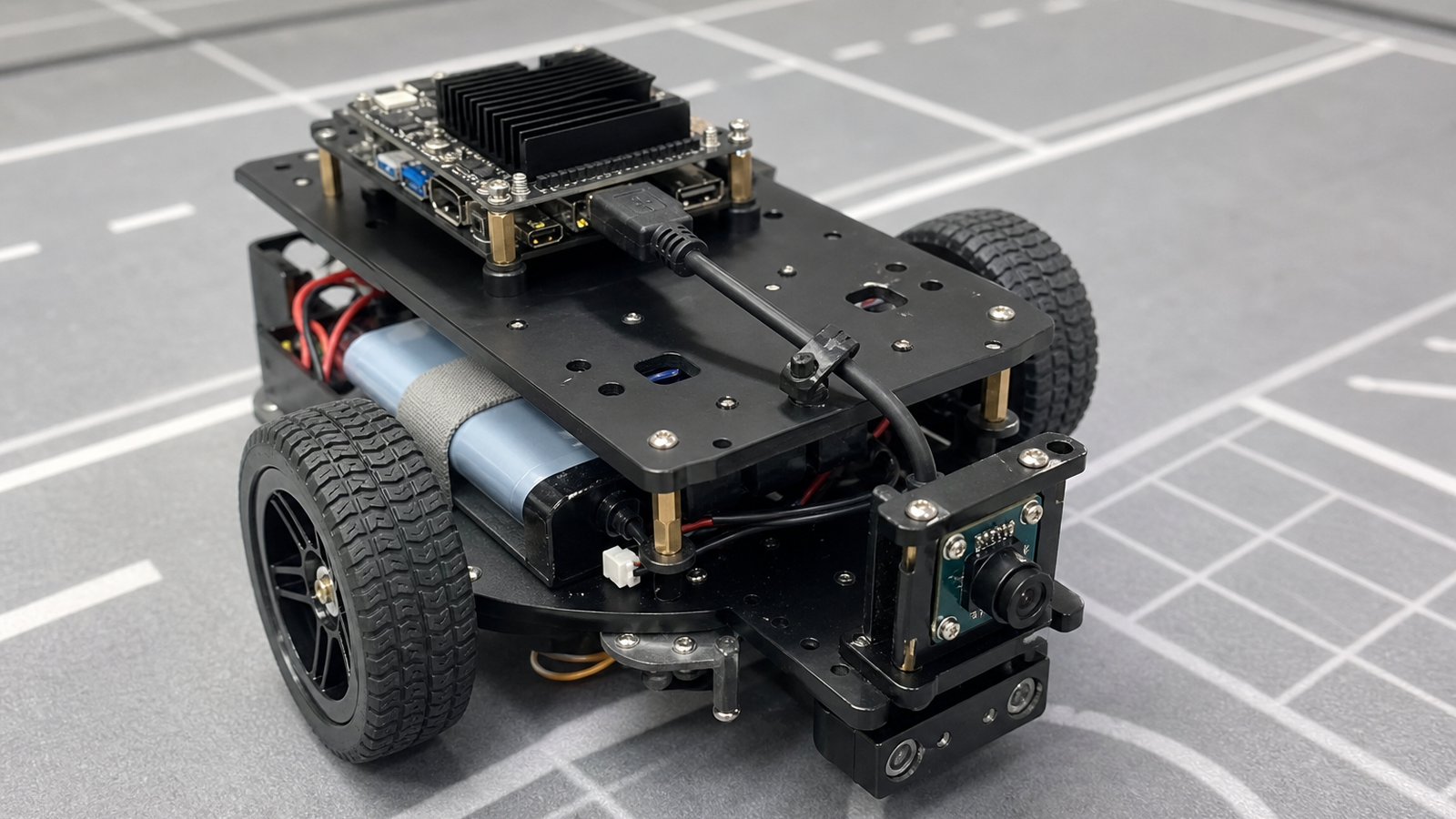 USB camera module connected to small robot computer with believable cable routing