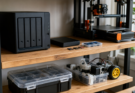 Maker lab storage shelf with NAS, 3D printer parts, camera cards and project drives