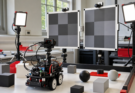 Student robotics vision test scene with camera, target panels and adjustable lights