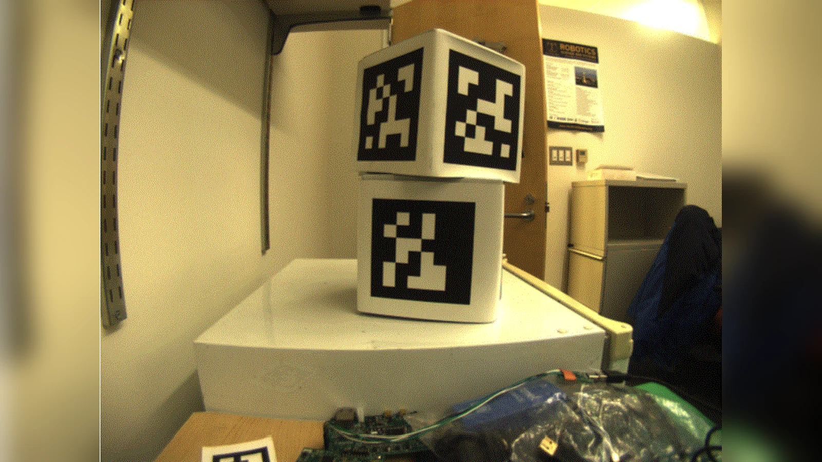 Multiple AprilTag targets mounted on flat boxes for camera testing