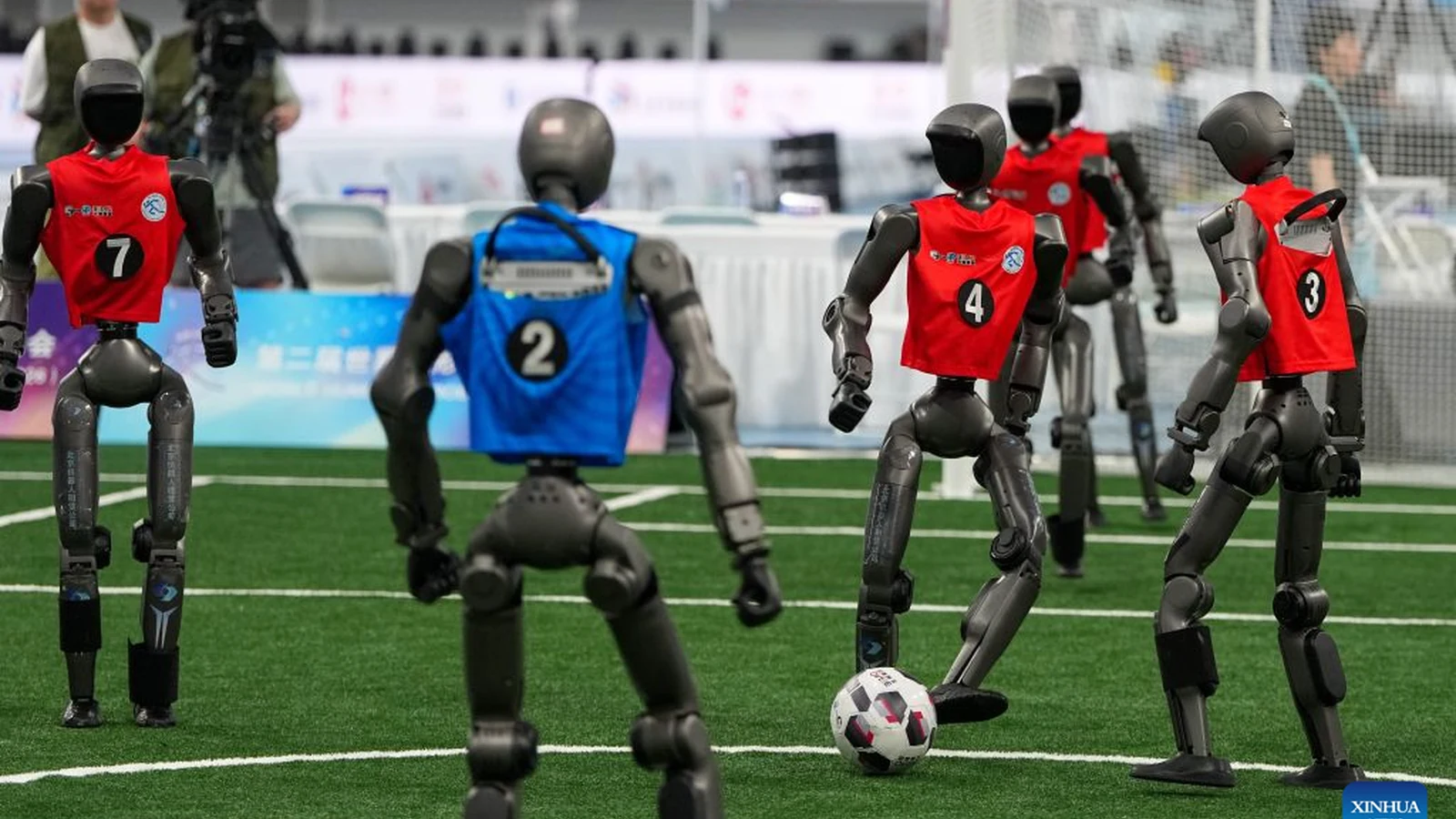 Humanoid robots competing in a football match at the 2026 World Humanoid Robot Games
