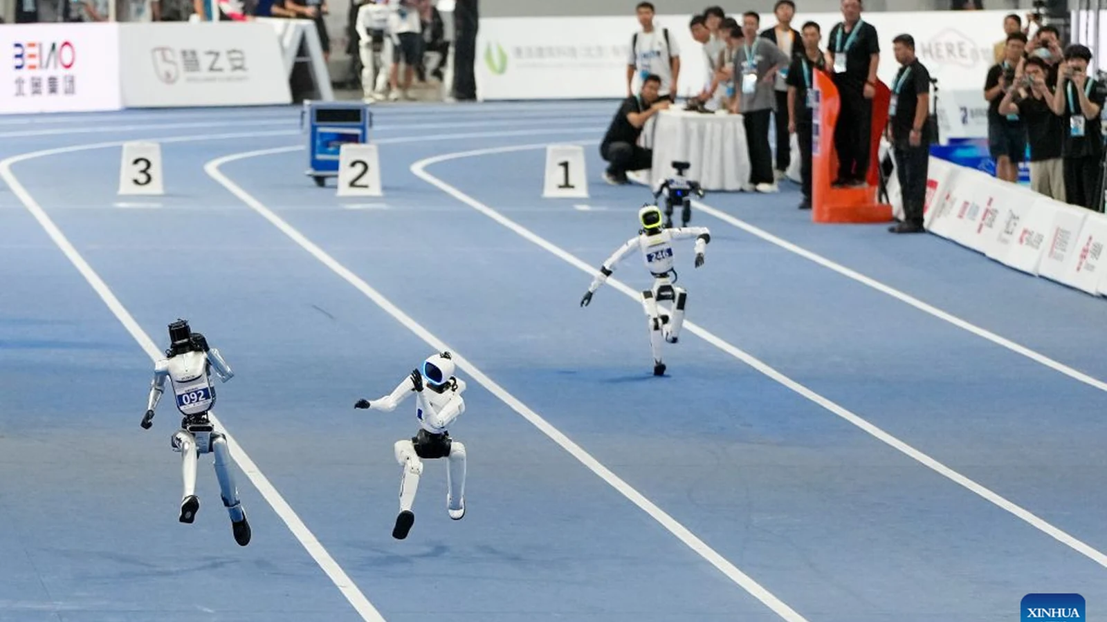 Humanoid robots running on a track at the 2026 World Humanoid Robot Games
