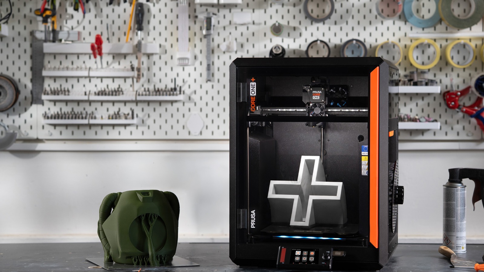 Official Prusa CORE One+ printer shown on a workbench