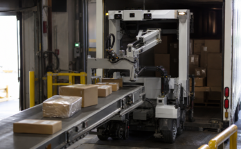 Autonomous trailer-loading robot concept working at the back of a parcel trailer