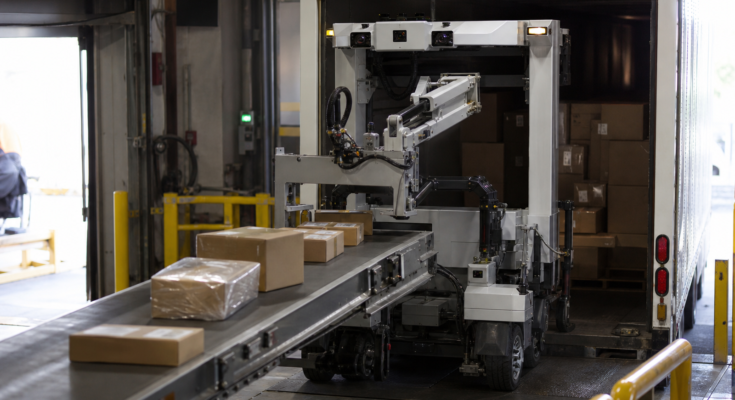 Autonomous trailer-loading robot concept working at the back of a parcel trailer Autonomous trailer-loading robot concept working at the back of a parcel trailer