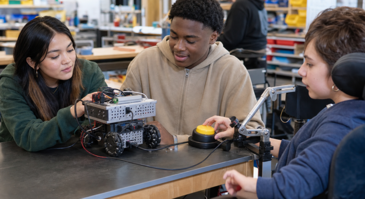 Classroom robotics table with adaptive accessibility switch and tabletop robot