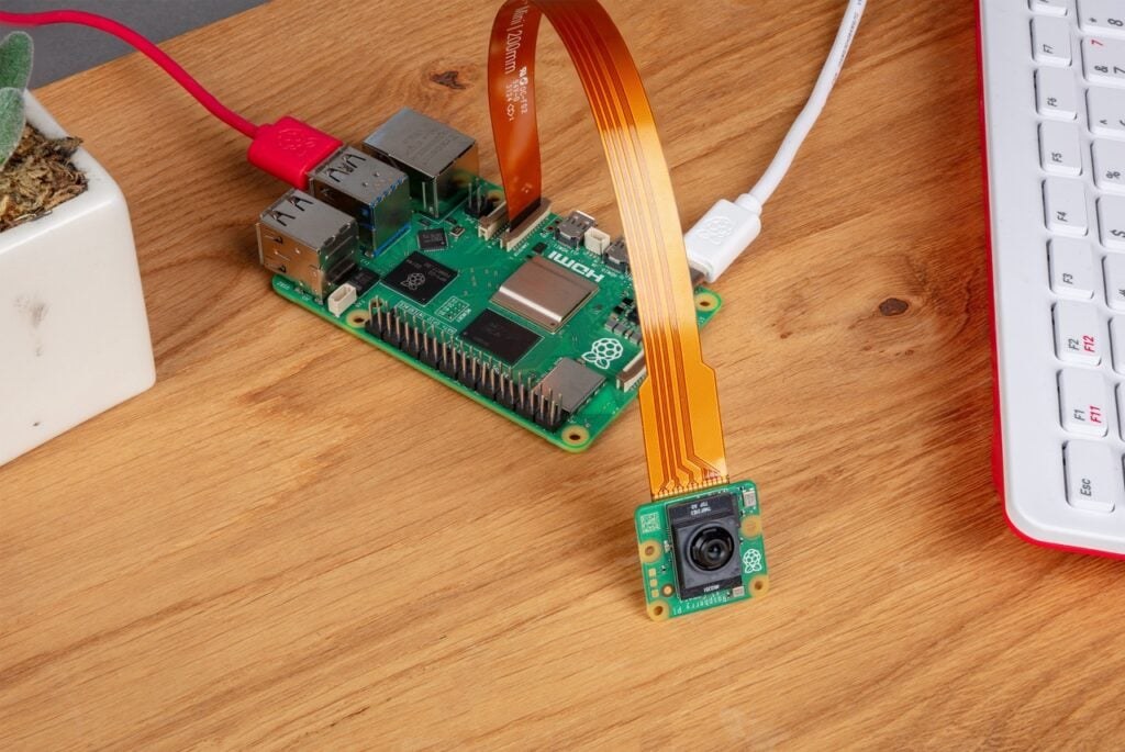 Raspberry Pi AI Camera connected for a compact vision AI project setup