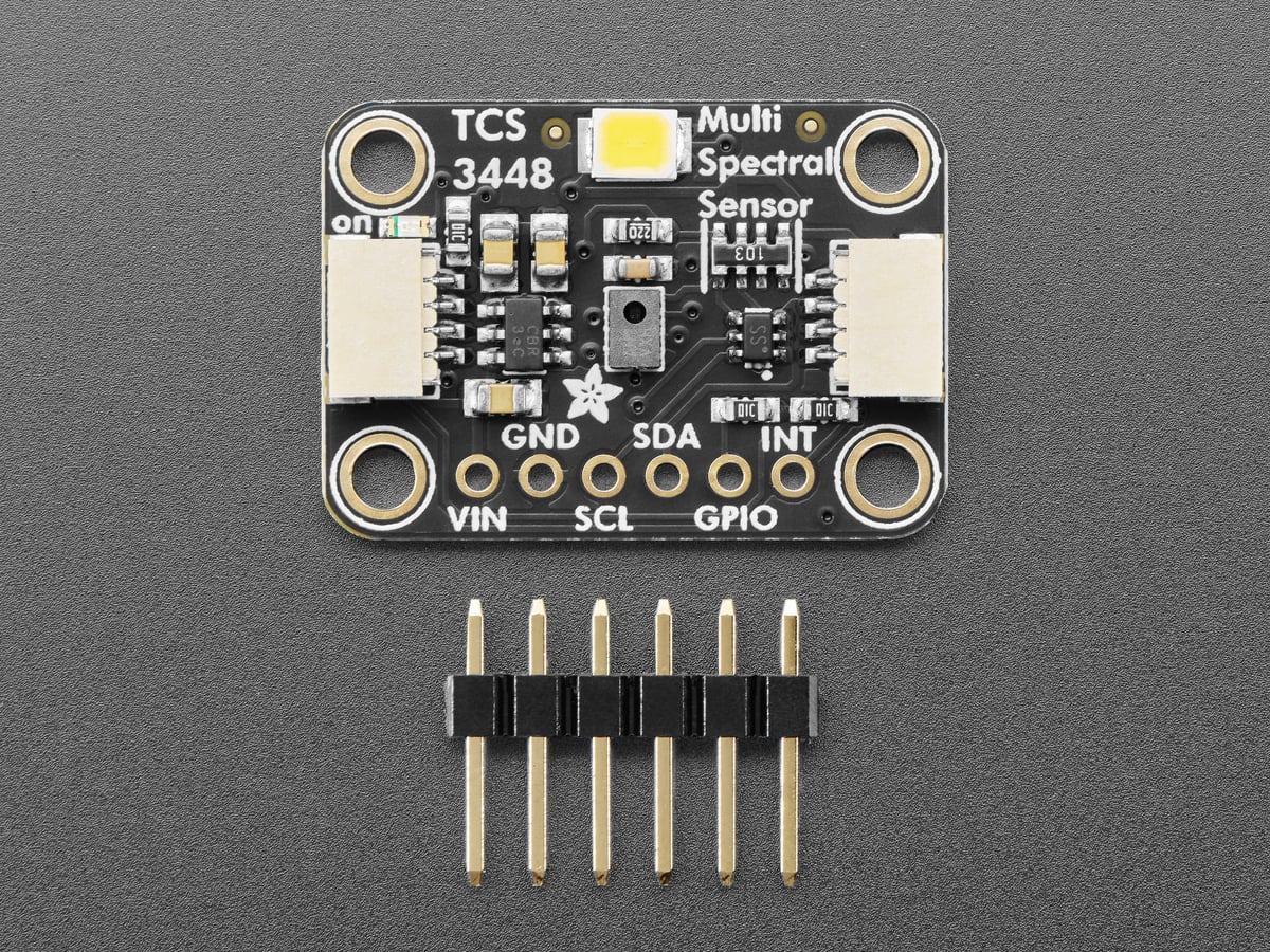 Front of the Adafruit TCS3448 breakout with included pin header