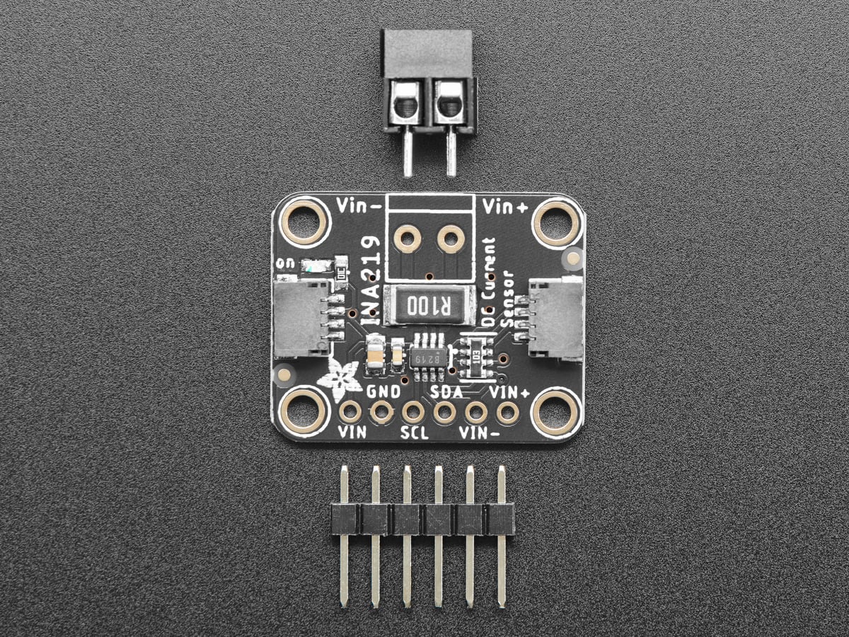 Adafruit INA219 breakout shown with screw terminal and header before assembly