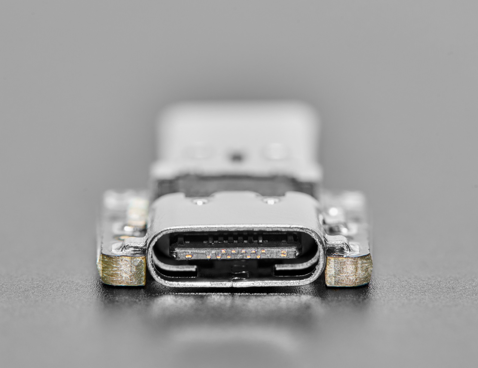 Adafruit USB-C CC resistor fixer connected between a cable and a load