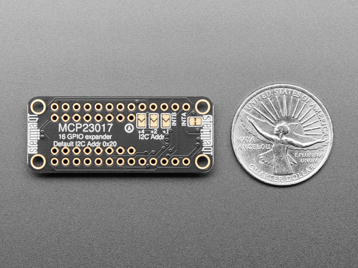 Rear view of the MCP23017 breakout beside a ruler