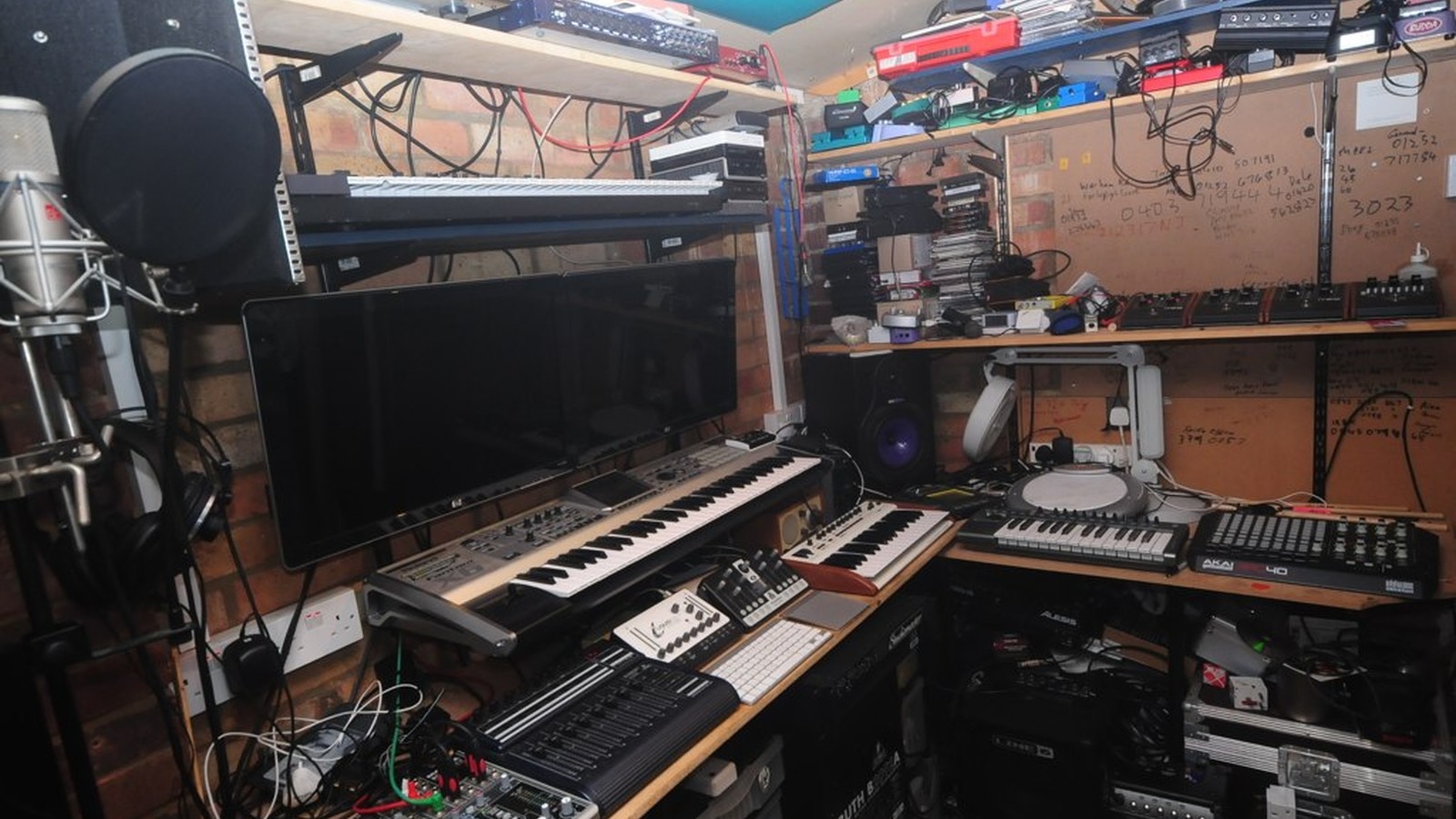 Home recording studio with microphone and audio equipment