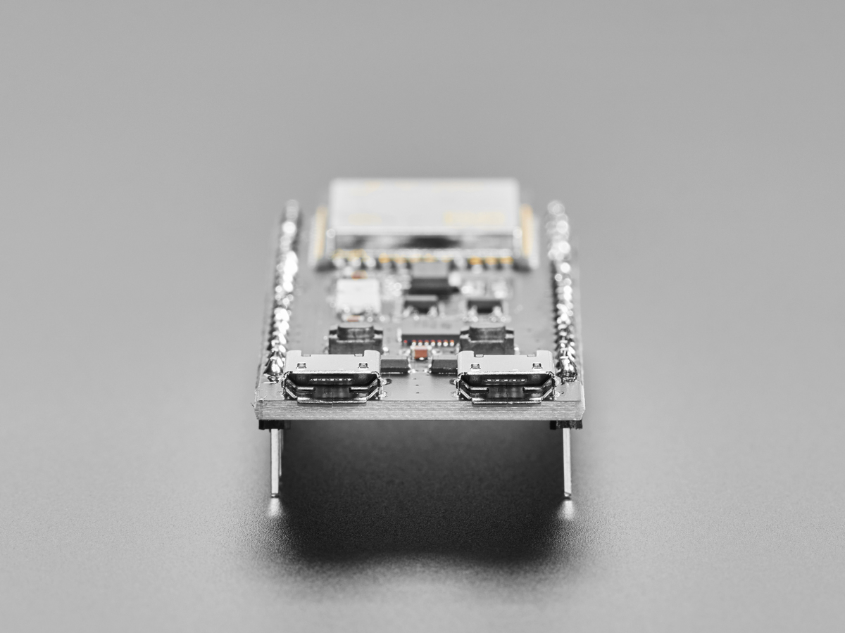 Low-angle view of the USB and UART connectors on an ESP32-S3 board