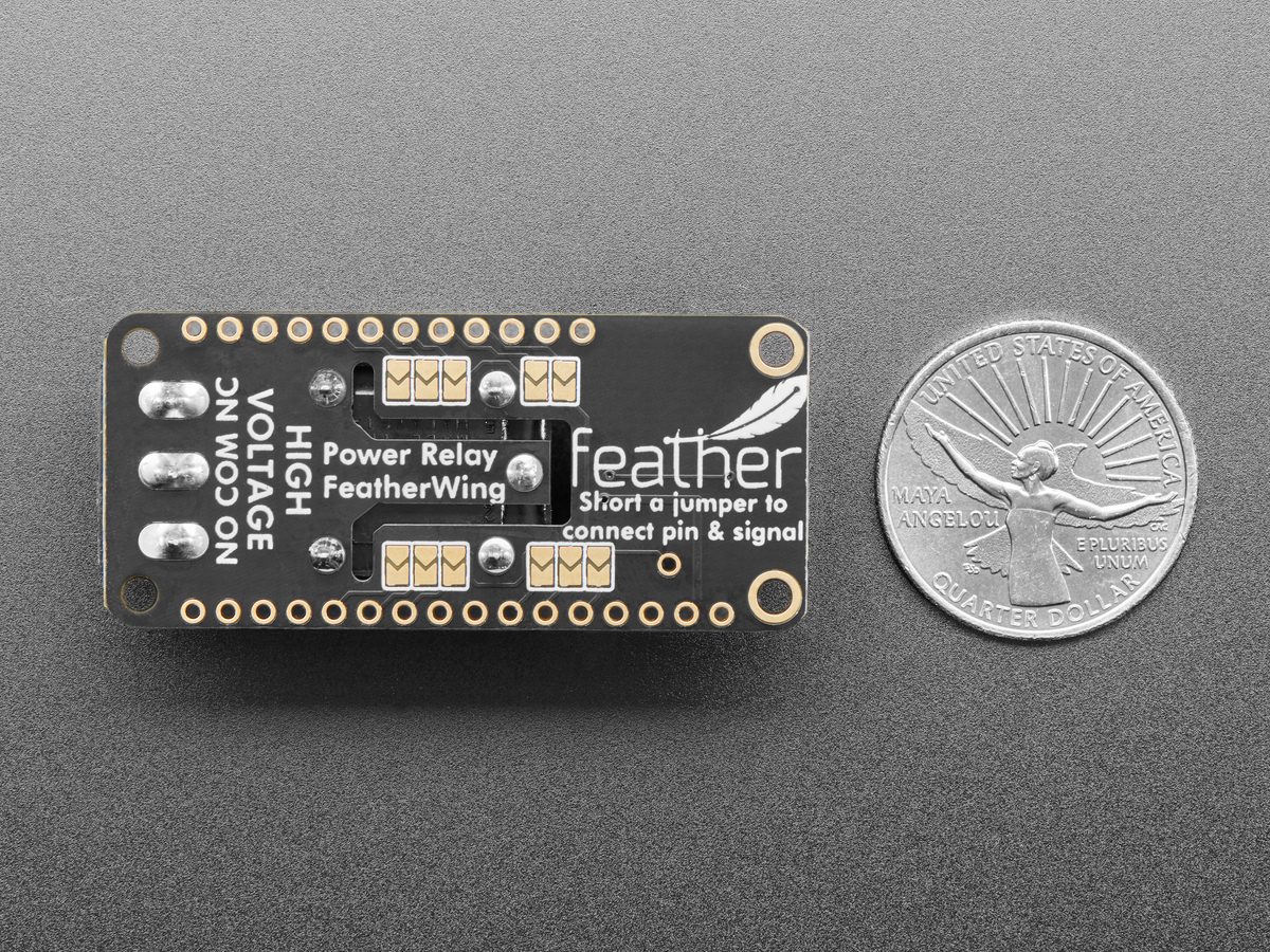 Top view of an Adafruit four-relay FeatherWing with terminal blocks