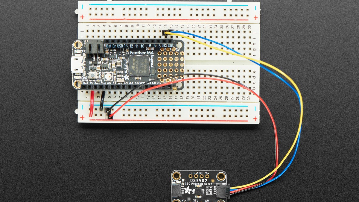 Adafruit DS3502 breakout wired to a microcontroller on a breadboard