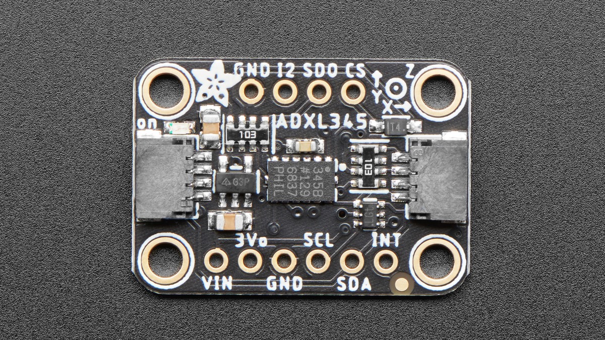 Top view of the Adafruit ADXL345 breakout showing the sensor and labeled interfaces