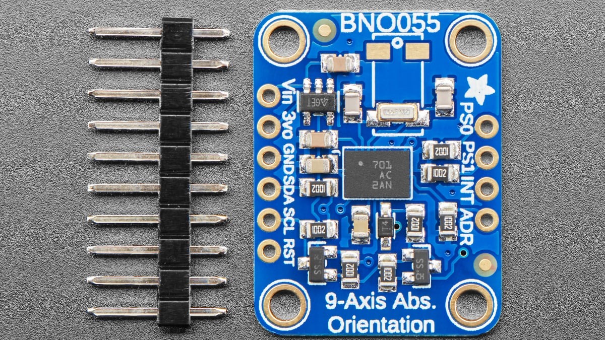 Top view of the Adafruit BNO055 breakout and header