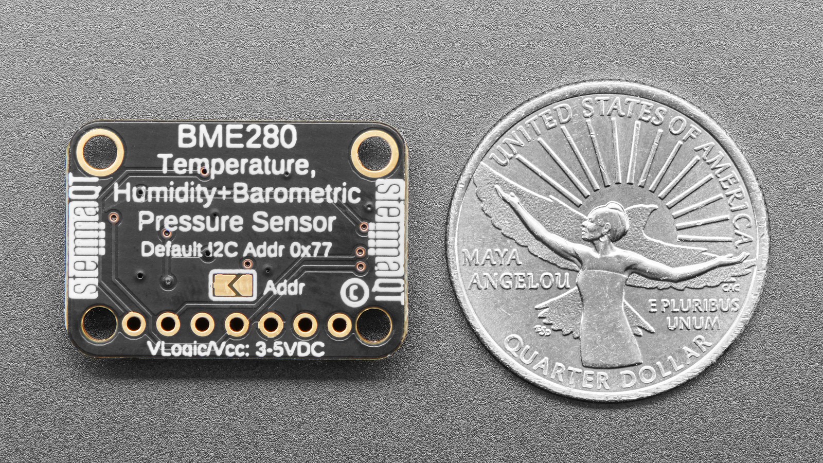 Back of Adafruit BME280 breakout shown beside a US quarter