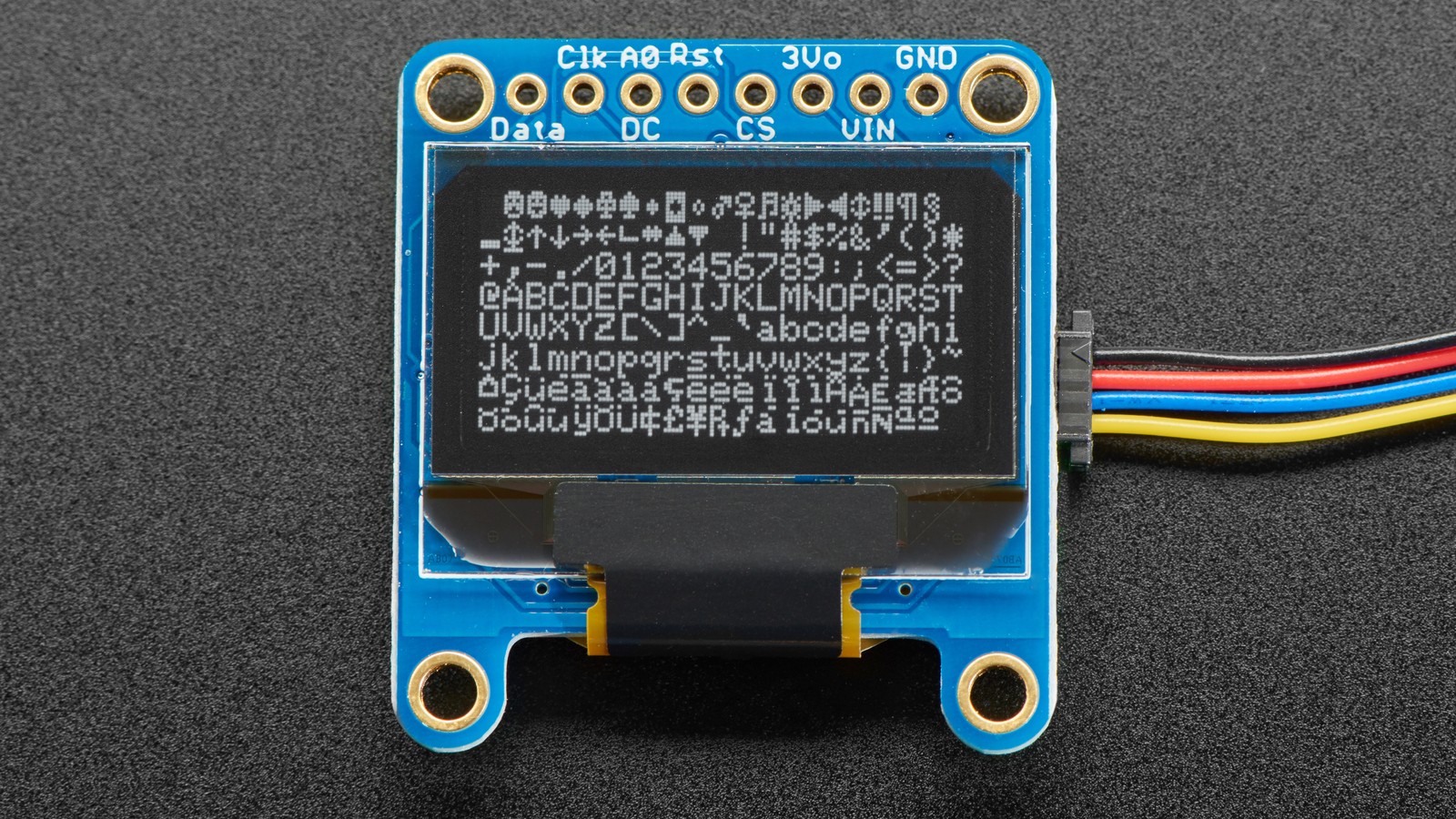 Adafruit SSD1306 OLED module showing white diagnostic text