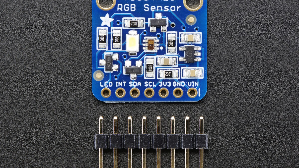 TCS34725 color sensor measuring an orange object under fixed illumination