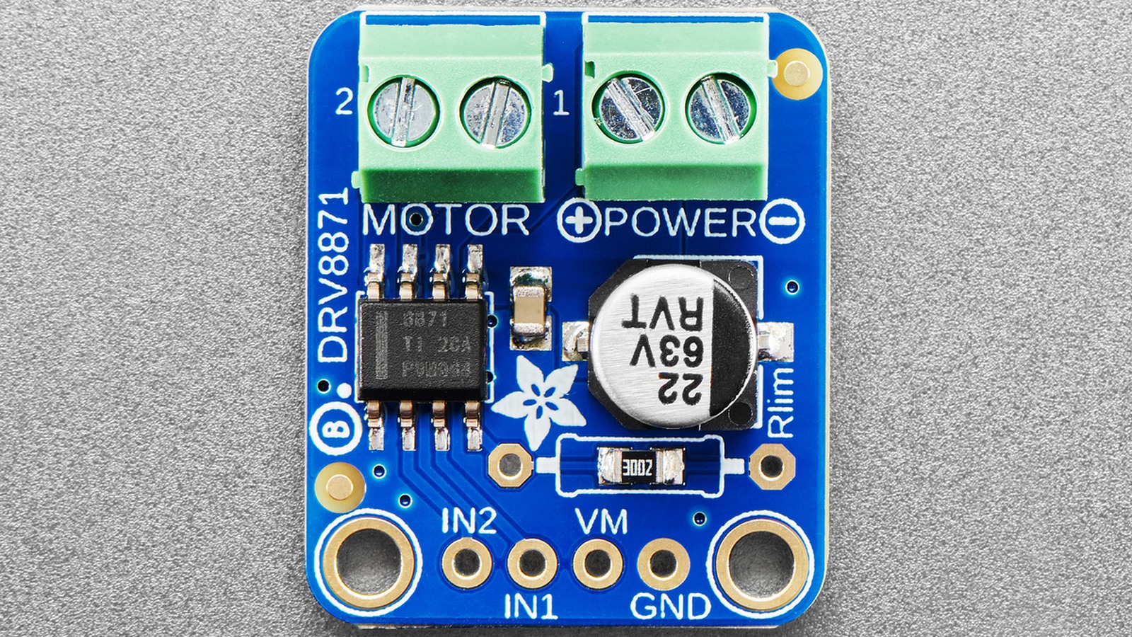 Angled view of the DRV8871 breakout showing the board, headers and motor terminals