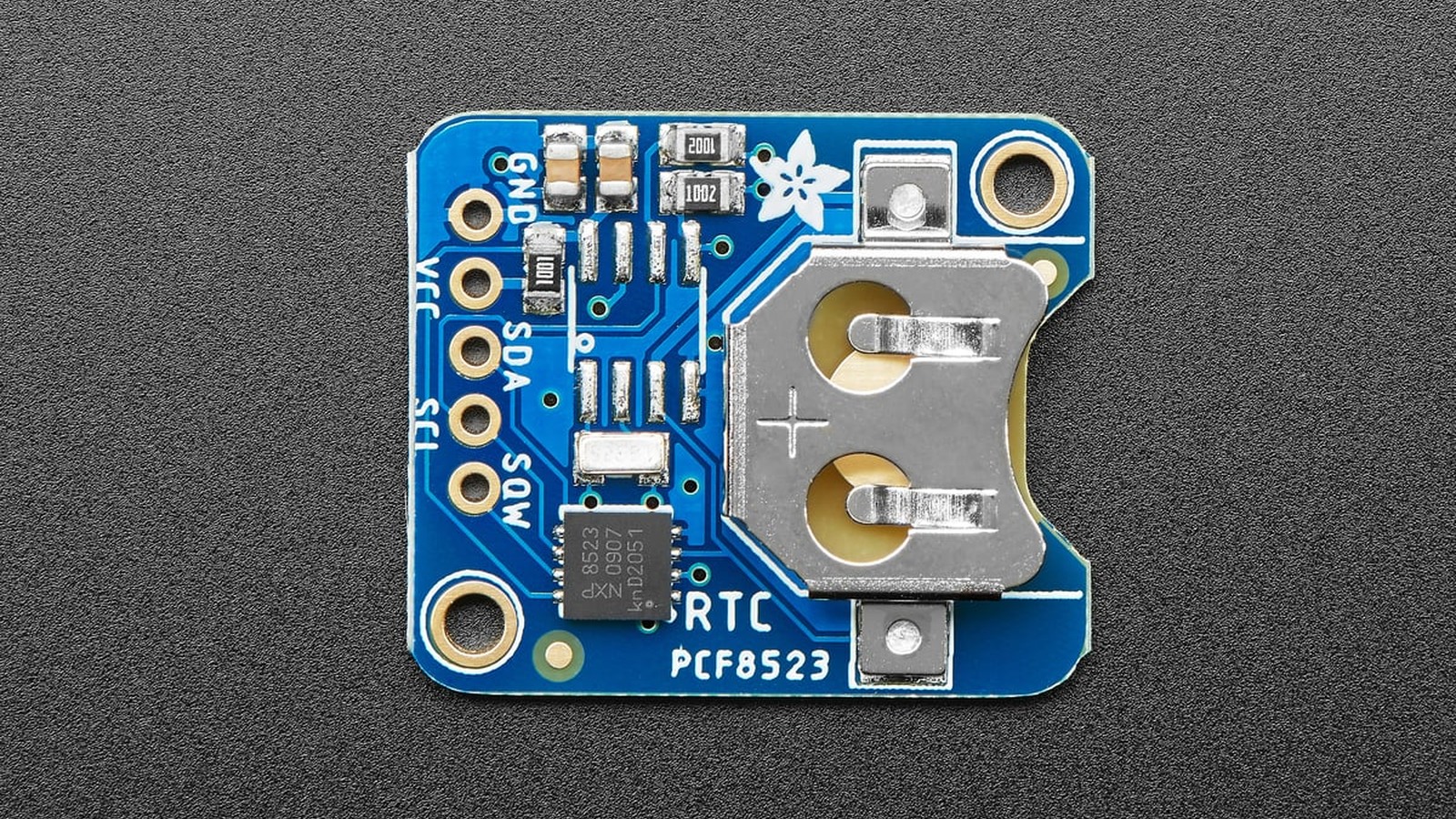 Top view of the Adafruit PCF8523 real-time clock breakout with coin-cell holder